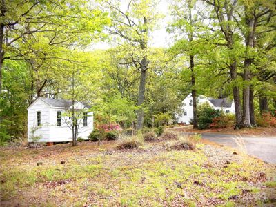 Storage Building on the Driveway side of the home. | Image 3