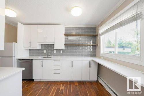 203-10540 80 Ave Nw, Edmonton, AB, T6E1V3 | Card Image