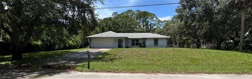614 Louella St, New Smyrna Beach, FL, 32168-7863 | Card Image
