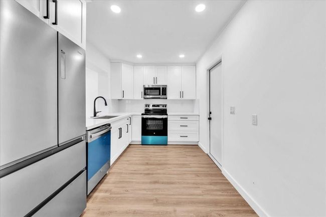 Newly Renovated with White Shaker Cabinets, Quartz Countertops & Stainless Steel Appliances | Image 5