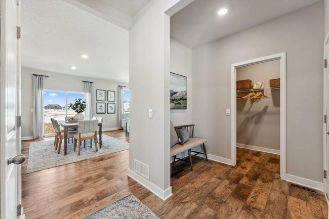 Your mud room entrance features space for seating and a large closet. Photo of model home, colors and finishes will vary. | Image 4