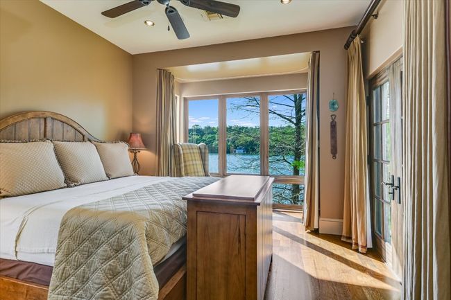 Bedroom with recessed lighting, ceiling fan, and wood finished floors | Image 31