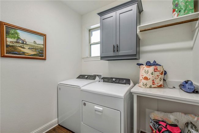 laundry room with cabinet space | Image 13