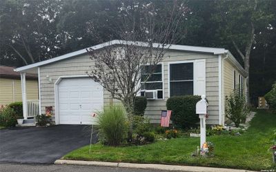 147 Village Circle W, House other with 2 bedrooms, 2 bathrooms and null parking in Manorville NY | Image 1