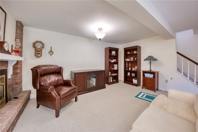 Game room with newer carpet | Image 32