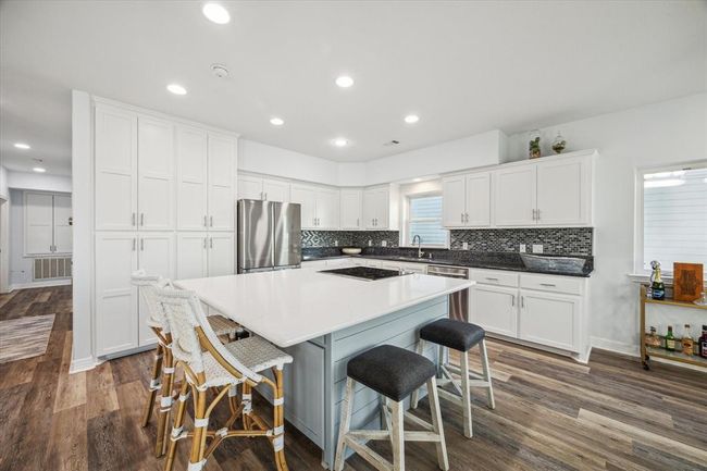 lots of seating at the kitchen island | Image 14