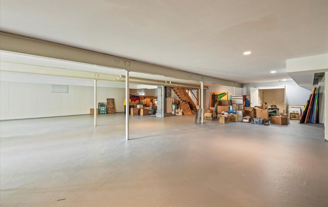 Finished below grade area featuring stairs and recessed lighting | Image 35