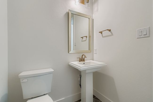 Half bath with toilet and baseboards | Image 18