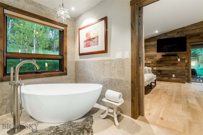 The primary suite features on demand hot water. | Image 32