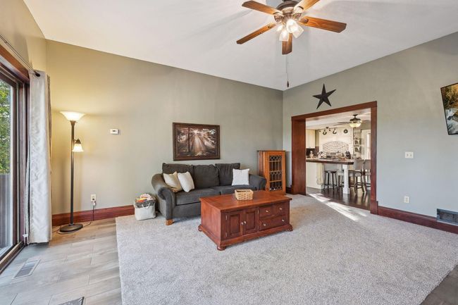 Another view of the family room and entrance to the room from the kitchen. | Image 20