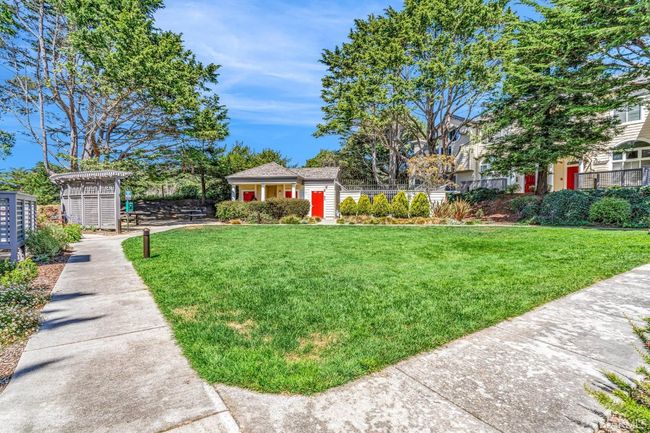 Grass area near bbq can be used for parties and get togethers | Image 42