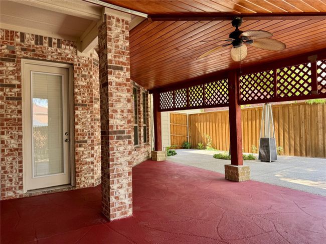 View of patio with a ceiling fan | Image 40
