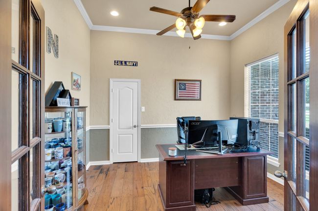 Office featuring baseboards, light wood finished floors, crown molding, ceiling fan, and recessed lighting | Image 9