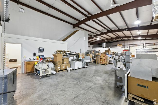 Garage with a workshop area | Image 6