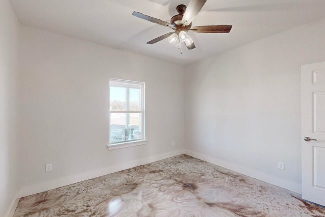Empty room with baseboards and a ceiling fan | Image 30