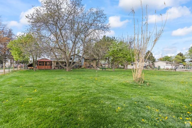View of yard featuring fence | Image 27