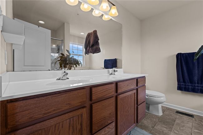 Primary bathroom with double sinks, soaking tub and separate shower | Image 19