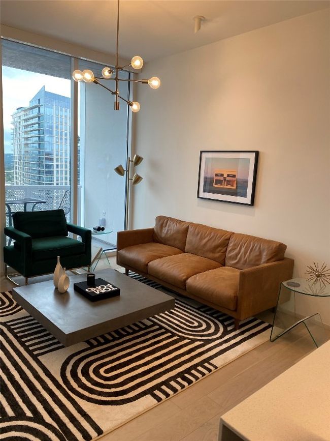 Living area featuring floor to ceiling windows | Image 23
