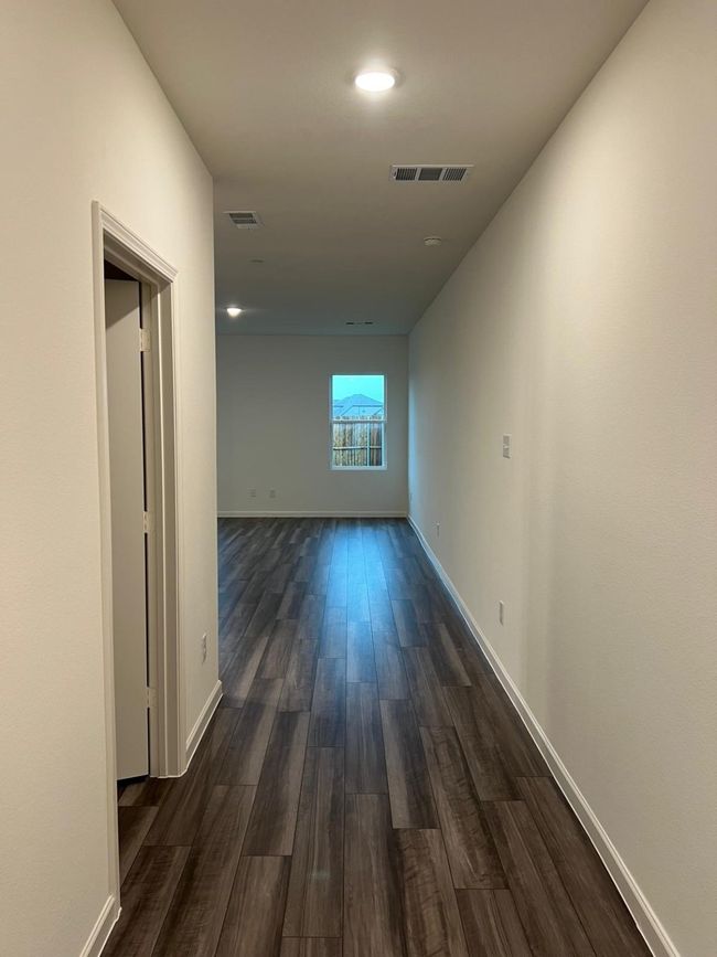 Corridor with dark wood finished floors, baseboards, and recessed lighting | Image 13