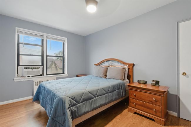 Bright bedroom with ample closets. | Image 12