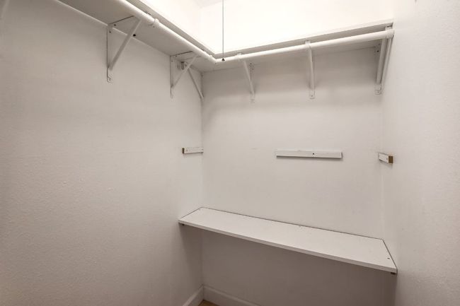 View of walk in closet | Image 33
