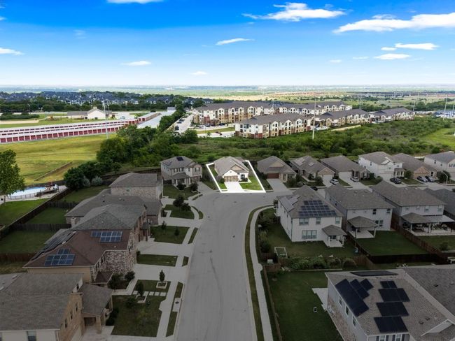 Aerial view of property and surrounding area featuring nearby suburban area | Image 38