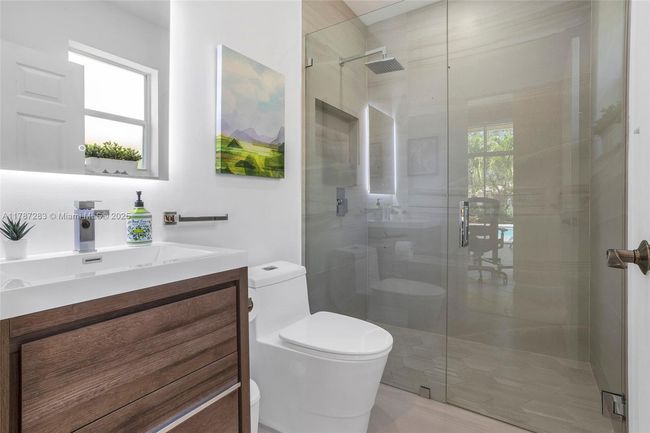 3848 Oak Ridge Cir, House other with 4 bedrooms, 3 bathrooms and null parking in Weston FL | Image 54