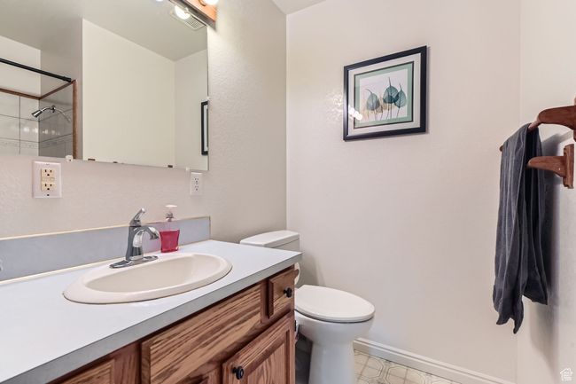Full bathroom featuring vanity and a shower | Image 16