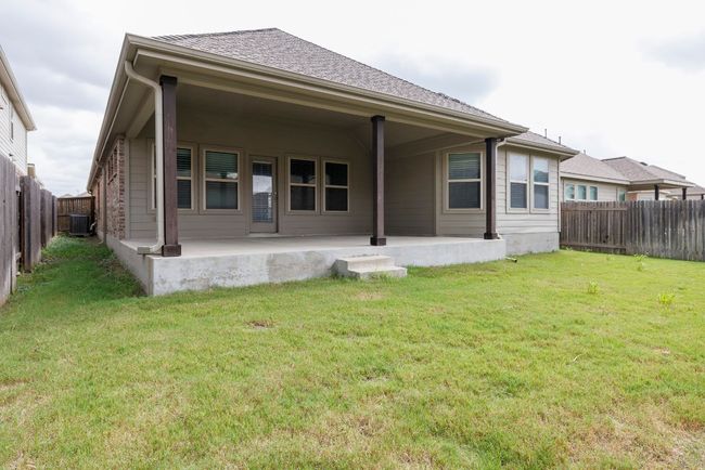Back of house featuring a patio area, a fenced backyard, and roof with shingles | Image 32