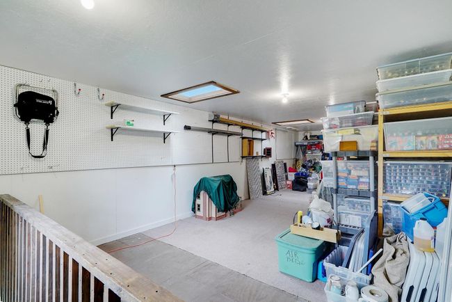 This great storage area could be used for entertaining or living space. | Image 40