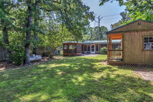 View of grassy yard with outbuilding and gazebo | Image 33