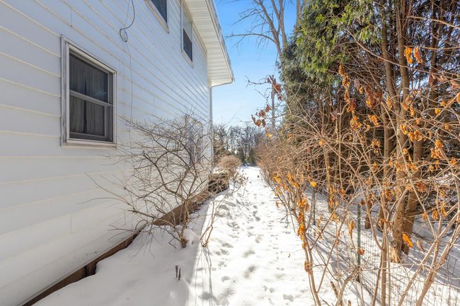 11212 W River Road, House other with 4 bedrooms, 3 bathrooms and null parking in Champlin MN | Image 45