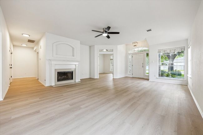 Living room with fireplace | Image 6