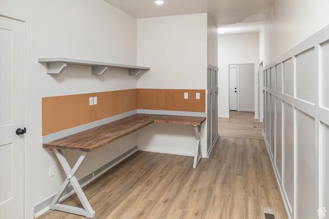 Unfurnished office featuring light hardwood / wood-style floors | Image 32