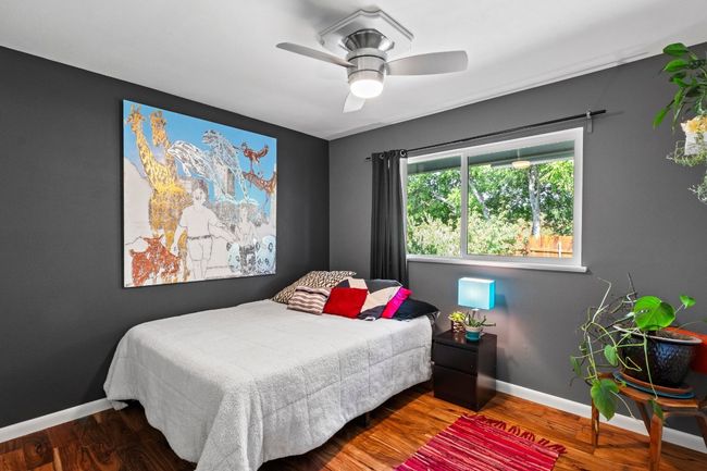 A 3rd bedroom overlooking the backyard. All Acacia wood floors - no carpet! | Image 33