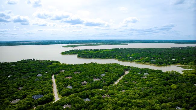Aerial view of community showcasing Lake Lewisville. | Image 37