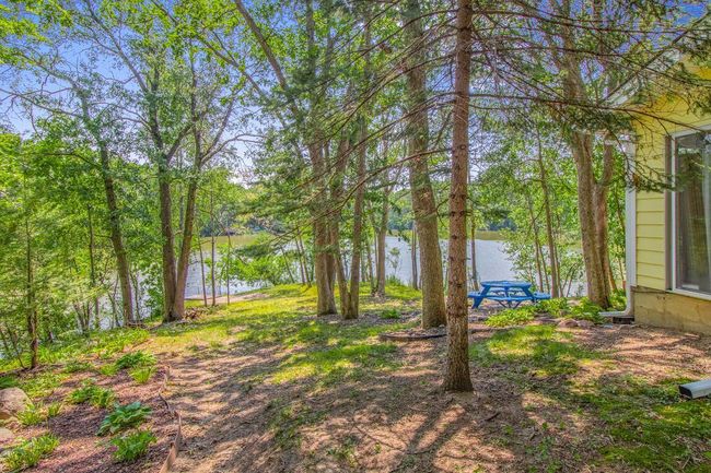The lot is just over one half acre and offers 250 feet of shoreline. | Image 46