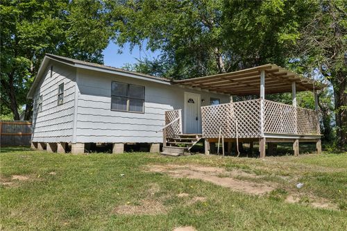 1303 W Main St, Madisonville, TX, 77864-1891 | Card Image