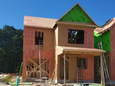 Actual home under construction as of 10/08/2024. The Ivey offers 5 bedrooms, 3.5 baths, and a garage. Durable EVP flooring throughout the first floor main living areas. Architectural details including wainscoting and crown molding give the space a polished look. | Image 2