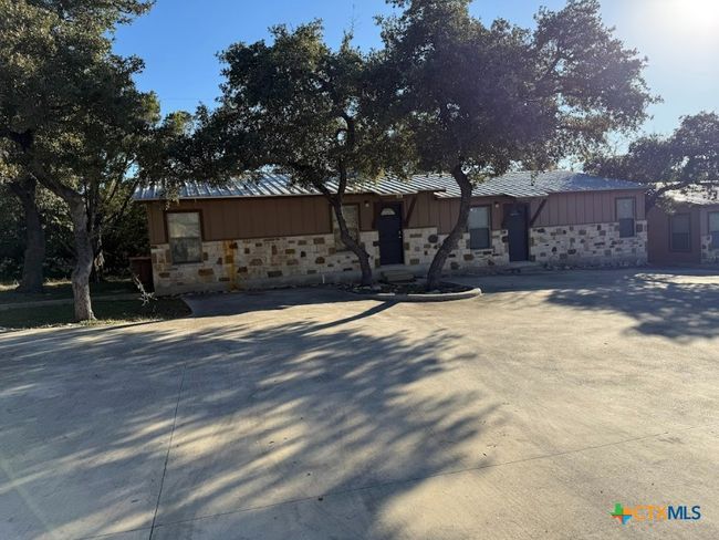 Each apartment has own entrance and back patio. Another view of apartment community. | Image 12
