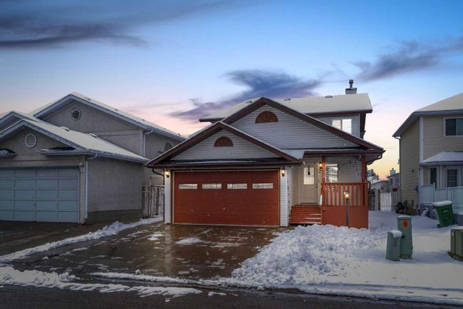 128 Laguna Close Ne, Home with 6 bedrooms, 4 bathrooms and 2 parking in Calgary AB | Image 1