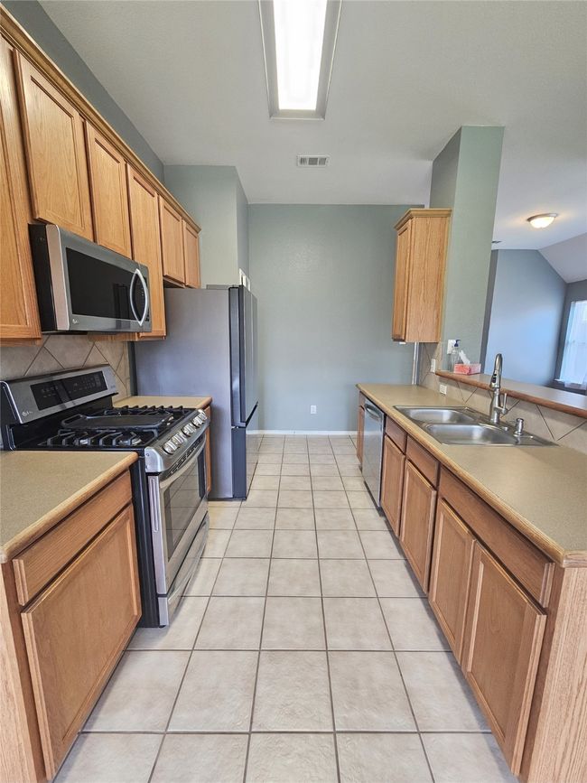 42" cabinets provide lots of storage | Image 21