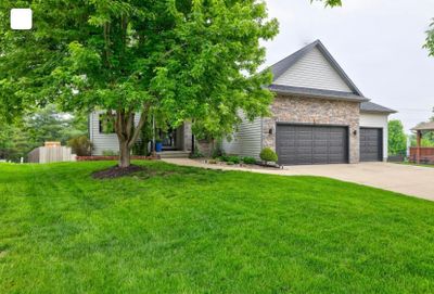 7781 Caldwell Circle, Home with 4 bedrooms, 3 bathrooms and null parking in Johnston IA | Image 1