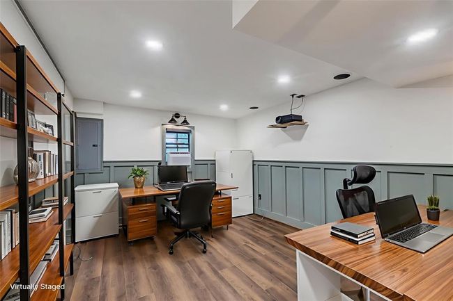 Additional finished space in the garage. Pre-wired for surround sound. Speakers built into the wall stay and media room lighting. | Image 6