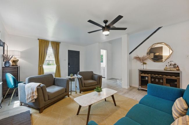 Natural light floods the room, enhancing the modern design and creating an airy, open feel. | Image 5