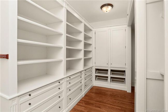 PRIMARY SUITE // The second dressing room offers an abundance of space and access to the 2nd floor hallway. | Image 22