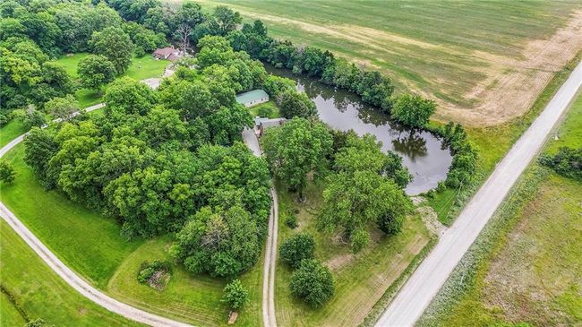 View of rural area featuring a nearby body of water | Image 79