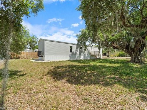 1038 Canopy Ln, MOORE HAVEN, FL, 33471-5602 | Card Image