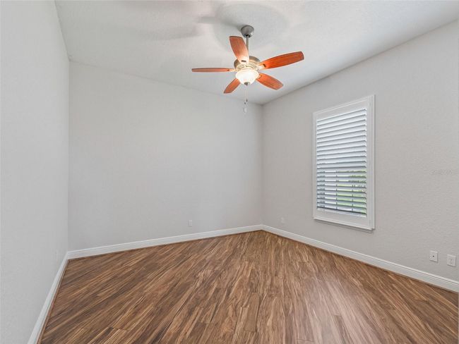 Bedroom 2 w/Laminate floor & Plantation shutters | Image 45