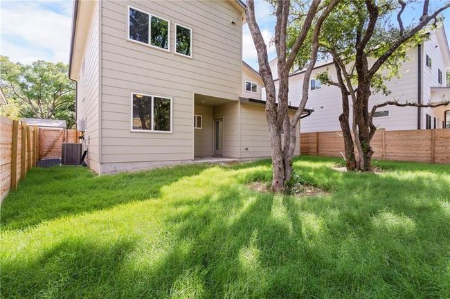 Back of property with a fenced backyard | Image 28
